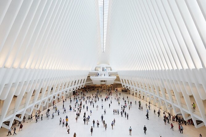 9/11 Memorial Tour with Optional Museum and One World Access - Start at Broadway and Warren Street, then you walk with context