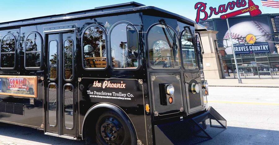 Atlanta: 1.5-Hour Highlight Trolley Tour - Getting On Board at the Hilton Garden Inn Peachtree Kiosk