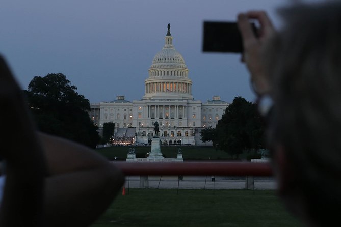 Big Bus DC: Monuments & Memorials Night Tour by Open-top Bus - Top-deck comfort: cold wins in winter, heat can win in summer