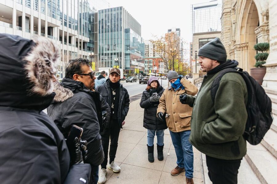 Chicago: Gangsters and Ghosts Guided Walking Tour - Chicago Theatre: architecture you can feel, with a dark narrative