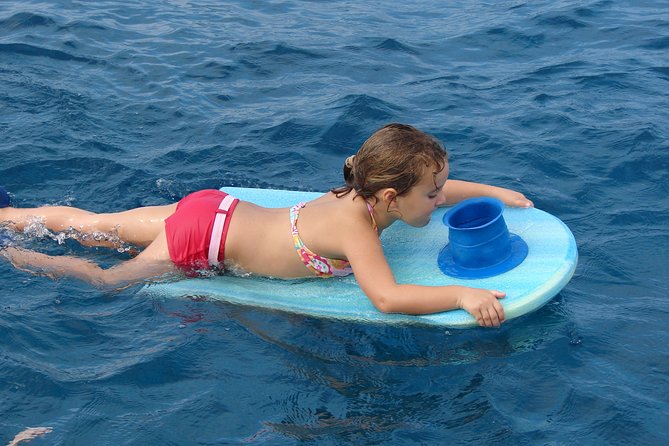 Deluxe Snorkel & Dolphin Watch Aboard a Luxury Catamaran from Kailua-Kona - Snorkeling at Red Hill: What to Expect From the Reef Life
