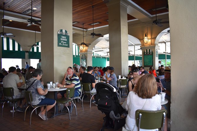 French Quarter Historical Sights and Stories Walking Tour - Royal Street: shopping, street performers, and smart dining leads