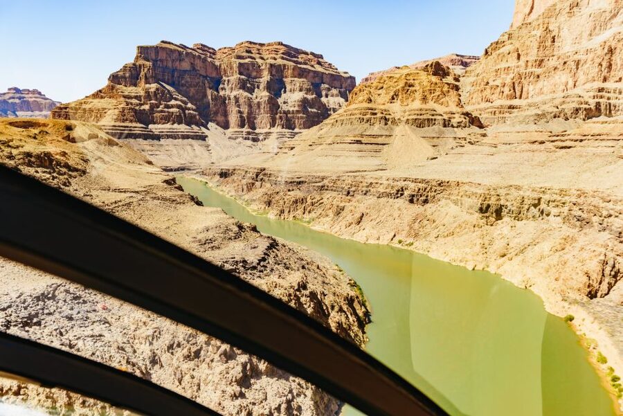 From Las Vegas: Grand Canyon Helicopter Tour with Champagne - Dropping Toward the Colorado River: Landing at the Grand Canyon West Rim