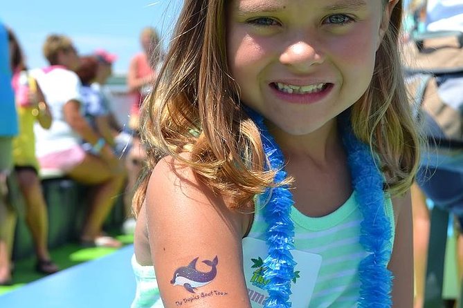 Guaranteed Dolphin Sighting Tour on Tropics Boat Tours - On-board commentary: Gulf Coast facts, celebrity mansions, and named crew