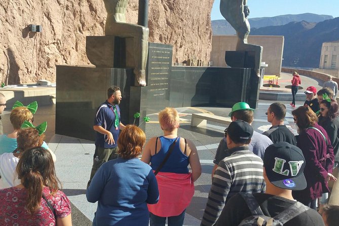 Hoover Dam Comedy Tour with Lunch and Comedy Club Tickets - Quick Vegas Photos at the Welcome Sign