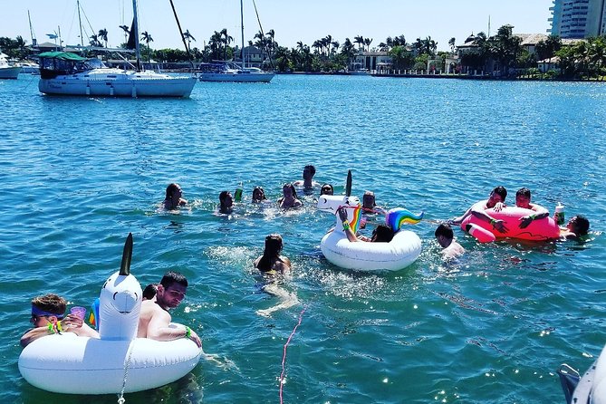 Island Time Boat Cruise in Fort Lauderdale - Portside perspective through canals: cruise ships, freighters, and the Venice of America