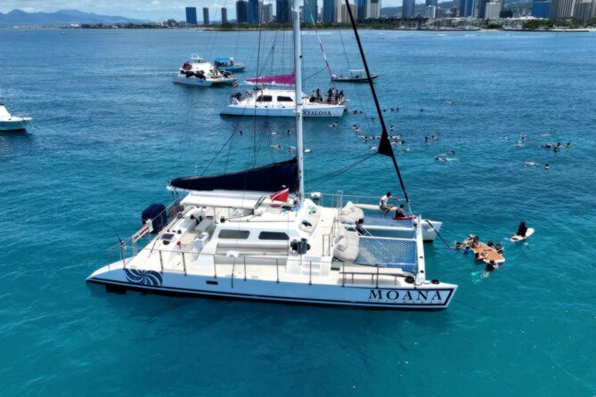 Moana’s Waikīkī Grand Guided Turtle Snorkel & Sailing Adventure - Turtle Canyon snorkeling with lifeguards and a catamaran that keeps it simple