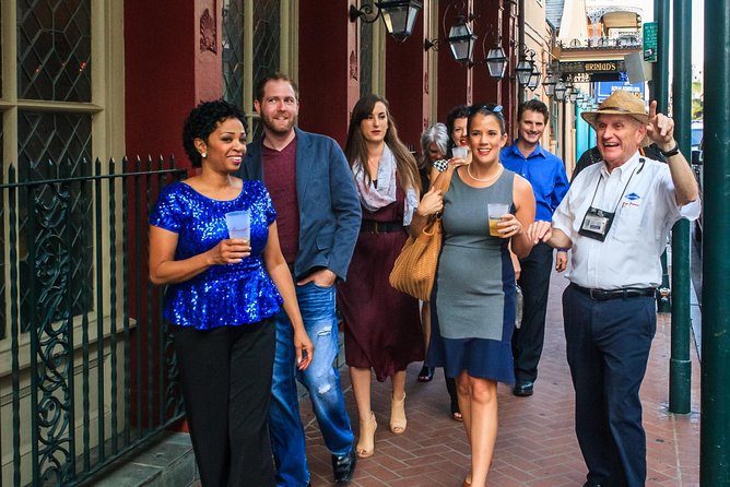 New Orleans Original Craft Cocktail Walking Tour - Stop 2 at Court of Two Sisters: courtyards, wisteria, and a classic meeting place