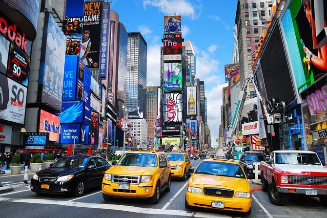 New York in One Day Guided Sightseeing Tour - Neighborhood drive-by: Greenwich Village, SoHo, Chinatown, and the Financial District
