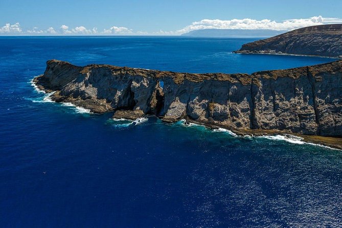 Ni'ihau and Na Pali Coast Snorkel Boat Tour - Stop 1: Na Pali Coast State Wilderness Park, cliffs, waterfalls, and first views