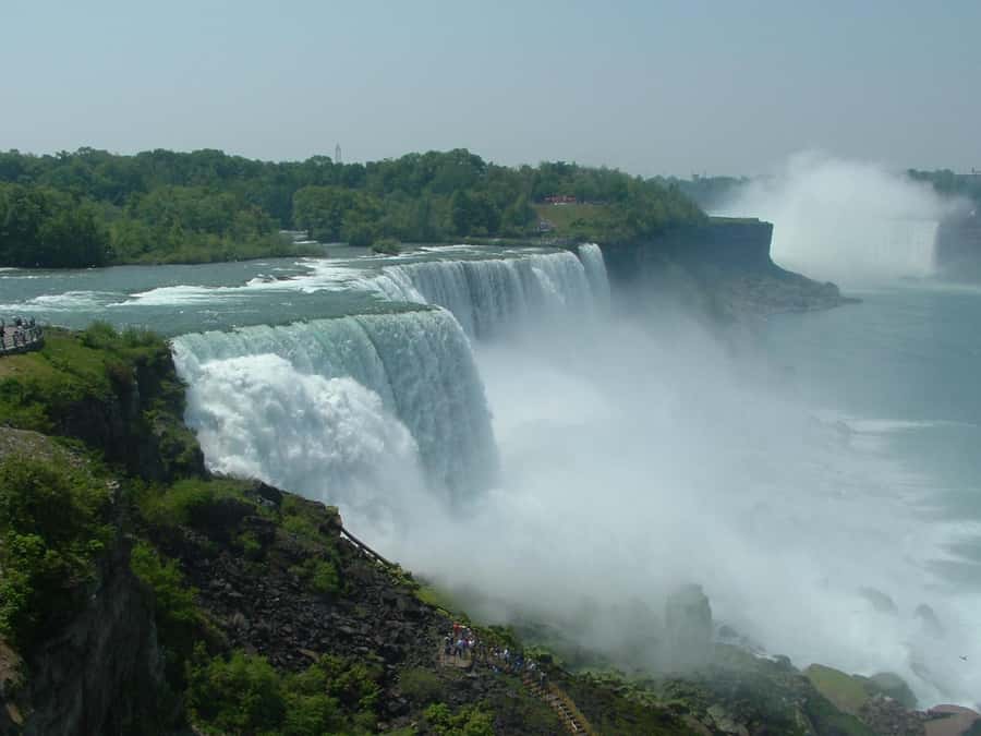Niagra Falls, USA Side: Boat, Cave and Shuttle pass Tour - US-side kickoff at Hard Rock Cafe, then straight to the action