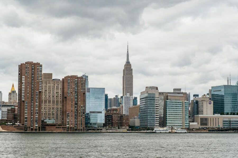 NYC: Around Manhattan Official NYC Architecture Cruise - Classic Lower Manhattan icons: Woolworth Building, Wall Street spires, and the Brooklyn Bridge
