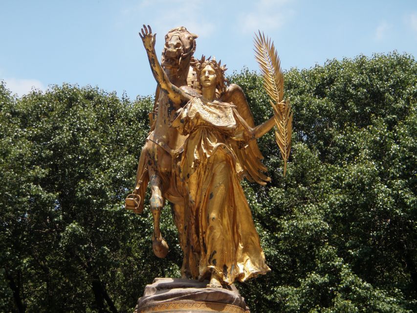 NYC: Central Park Guided Bike Tour - Strawberry Fields: a respectful stop with landmark-level meaning