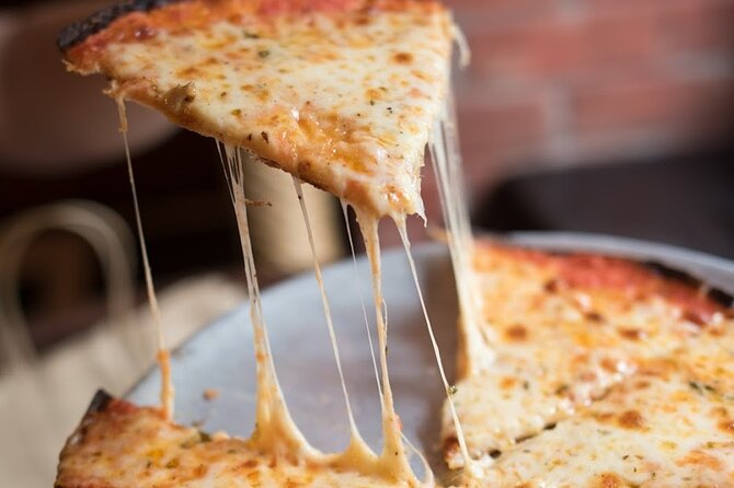 NYC: Greenwich Village Food Tour with 6 Locals Favorites Dishes - Falafel, bagels, and pizza: the comfort-food spine of the tour