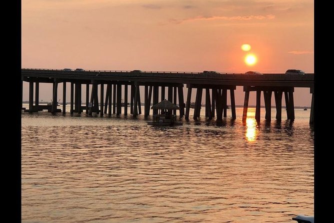 Original Cruisin' Tikis Sunset Cruise - Dolphins, Music, and Captains Who Set the Tone