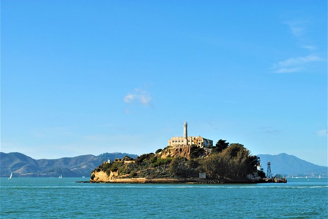 San Francisco: Alcatraz Island & Hop-on Hop-off Sightseeing Tour - Alcatraz Island: ferry ride, Cell House audio, and what to plan for