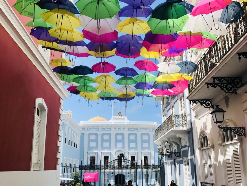 San Juan: Old Town Sunset Walking Tour - Antiguo Palacio de la Intendencia, money, government, and stonework