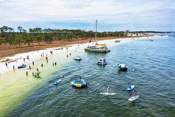 Shell Island Inflatable Adventure Park & Dolphin Sightseeing Tour - Shell Island Meets a Dolphin-Search Catamaran