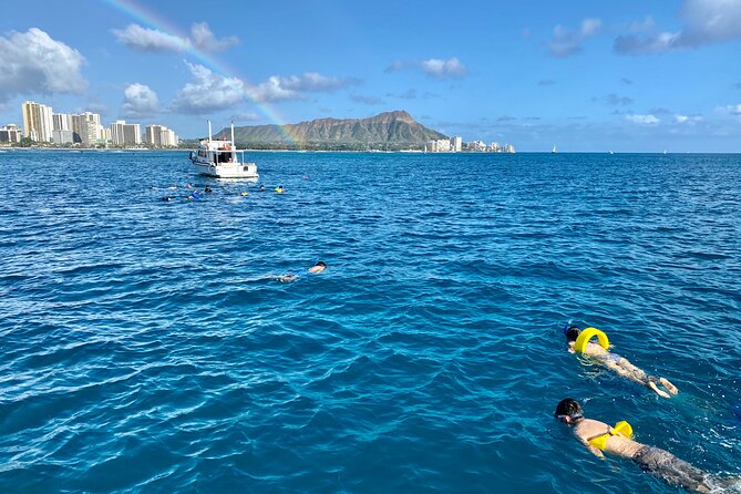 Small Group Turtle Canyon Snorkel in Waikiki (Boat Tour) - Catamaran comfort, shade, and crew energy on the water