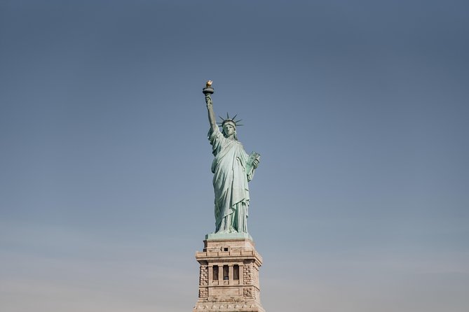 Statue of Liberty and Ellis Island Guided Tour with Ferry - Ellis Island on the longer option: immigration stories plus an audio guide you can control