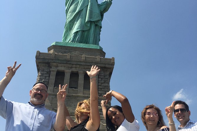 Statue of Liberty, Ellis Island, and 9/11 Memorial Guided Tour - Ground Zero and the 9/11 Memorial Pools walk