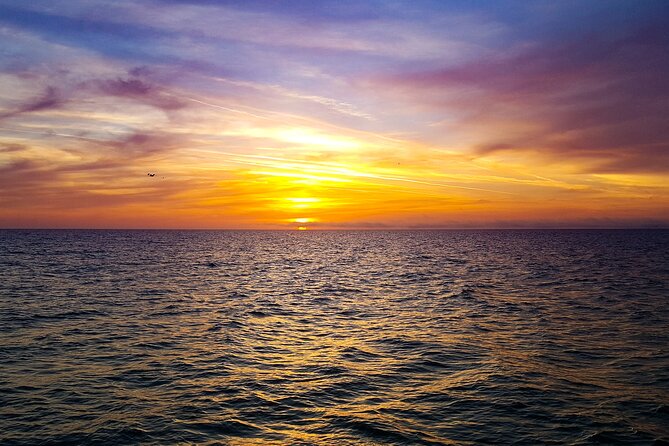 Sunset Celebration Cruise on Tropics Boat Tours - Getting the best sunset photos: seats, horizon watching, and comfort