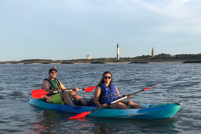 Sunset Dolphin Kayak Tours - Chasing Atlantic bottlenose dolphins along the shoreline