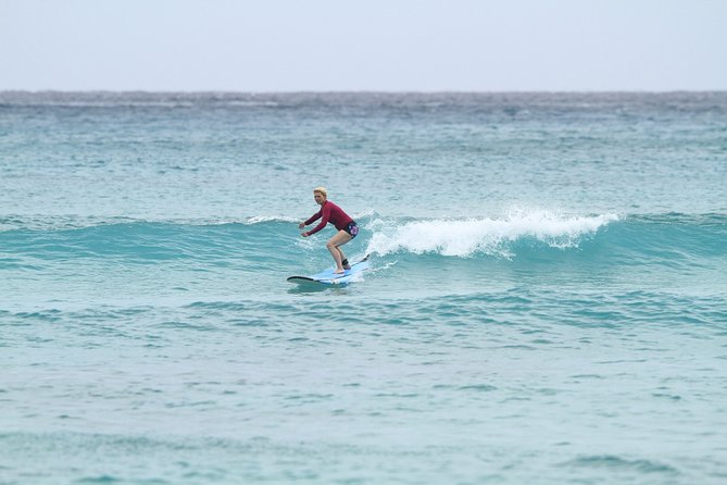 Surfing Lessons On Waikiki Beach - In the Water at Waikiki: What Coaching Looks Like for First Waves