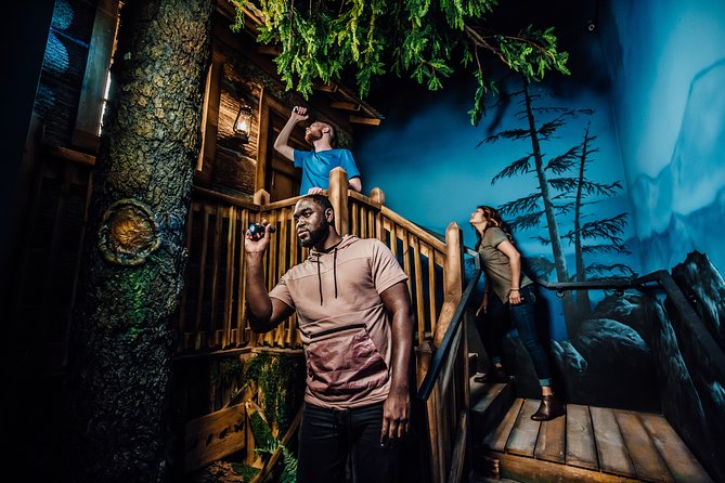 The Escape Game Pigeon Forge: 60-Minute Adventures on The Island - Inside the room: locked door, exit button, and game design that stays upbeat